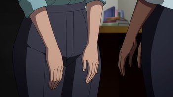 Movie still from “The Death and Return of Superman” (2019), directed by Sam Liu – Two hands touching each other in front of a wall; Medium shot, High angle