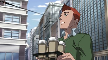 Movie still from “The Death and Return of Superman” (2019), directed by Sam Liu – A man holding a tray of coffee on a city street; Medium shot, Over the shoulder angle