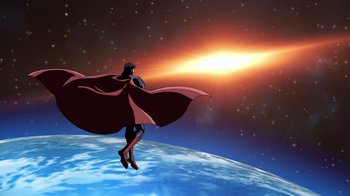 Movie still from “The Death and Return of Superman” (2019), directed by Sam Liu – A man standing on top of the earth in front of the sun; Extreme Wide shot, Low angle