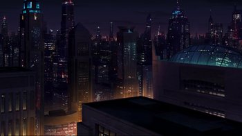 Movie still from “The Death and Return of Superman” (2019), directed by Sam Liu – A view of a city at night from a building; Extreme Wide shot, High angle