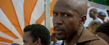 Movie still from “The Deep” (1977), directed by Peter Yates – A person with a beard; Close Up shot, Low angle