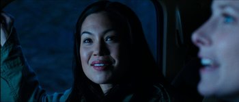 Movie still from “The Descent” (2005), directed by Neil Marshall – A person sitting in a chair; Close Up shot, High angle