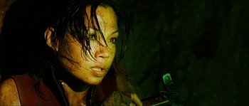 Movie still from “The Descent” (2005), directed by Neil Marshall – A person holding a cell phone; Close Up shot, High angle