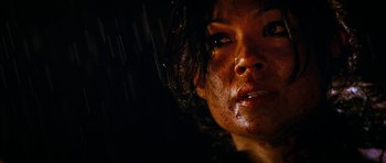 Movie still from “The Descent” (2005), directed by Neil Marshall – A woman's face covered in water; Close Up shot, Low angle