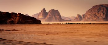 Movie still from “The Devil's Double” (2011), directed by Lee Tamahori – A view of a mountain range from a car window; Extreme Wide shot, High angle
