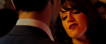 Movie still from “The Devil's Double” (2011), directed by Lee Tamahori – A man and a woman are looking into each others eyes; Extreme Close Up shot, Over the shoulder angle
