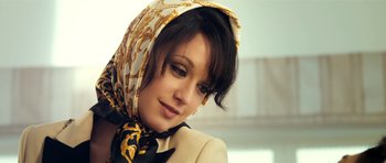 Movie still from “The Devil's Double” (2011), directed by Lee Tamahori – A person wearing a head scarf; Close Up shot, Low angle