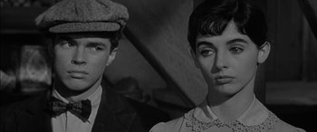 Movie still from “The Diary of Anne Frank” (1959), directed by George Stevens – A black and white photo of a man and a woman; Close Up shot, Low angle