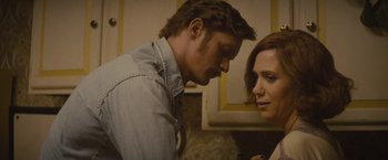 Movie still from “The Diary of a Teenage Girl” (2015), directed by Marielle Heller – A man and a woman standing next to each other in a kitchen; Close Up shot, Over the shoulder angle