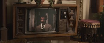 Movie still from “The Diary of a Teenage Girl” (2015), directed by Marielle Heller – A man on a television screen; Extreme Close Up shot, High angle