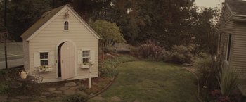 Movie still from “The Diary of a Teenage Girl” (2015), directed by Marielle Heller – A house with a garden in the back yard; Extreme Wide shot, High angle