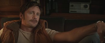 Movie still from “The Diary of a Teenage Girl” (2015), directed by Marielle Heller – A person sitting on a couch; Close Up shot, Over the shoulder angle