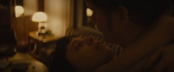 Movie still from “The Diary of a Teenage Girl” (2015), directed by Marielle Heller – A man and a woman laying in a bed together; Close Up shot, Overhead angle