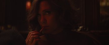 Movie still from “The Diary of a Teenage Girl” (2015), directed by Marielle Heller – A person smoking a cigarette; Close Up shot, High angle