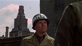 Movie still from “The Dirty Dozen” (1967), directed by Robert Aldrich – Medium shot, Low angle