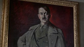 Movie still from “The Dirty Dozen” (1967), directed by Robert Aldrich – A painting of adolf hitler is displayed on a wall; Close Up shot, Low angle