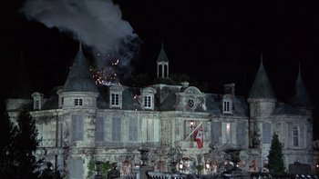 Movie still from “The Dirty Dozen” (1967), directed by Robert Aldrich – An old building that has been destroyed by a fire; Extreme Wide shot, Low angle