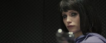 Movie still from “The Disappearance of Alice Creed” (2009), directed by J Blakeson – A person holding a glass of water; Close Up shot, Over the shoulder angle