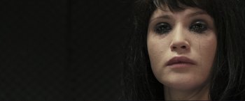 Movie still from “The Disappearance of Alice Creed” (2009), directed by J Blakeson – A person's face in a dark room; Close Up shot, Over the shoulder angle