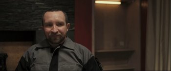 Movie still from “The Disappearance of Alice Creed” (2009), directed by J Blakeson – A person wearing a shirt and a tie; Close Up shot, Over the shoulder angle