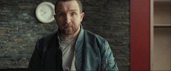 Movie still from “The Disappearance of Alice Creed” (2009), directed by J Blakeson – A person wearing a jacket; Medium shot, Over the shoulder angle