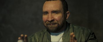 Movie still from “The Disappearance of Alice Creed” (2009), directed by J Blakeson – A person with a beard; Close Up shot, Over the shoulder angle