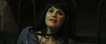 Movie still from “The Disappearance of Alice Creed” (2009), directed by J Blakeson – A person holding a rope; Close Up shot, High angle