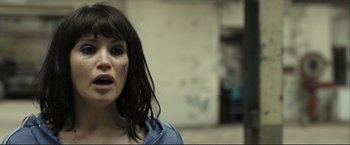 Movie still from “The Disappearance of Alice Creed” (2009), directed by J Blakeson – A person with a face tattoo; Close Up shot, Over the shoulder angle