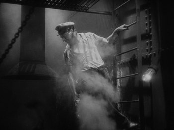 Movie still from “The Docks of New York” (1928), directed by Josef von Sternberg – A black and white photo of a man jumping in the air; Medium shot, Low angle