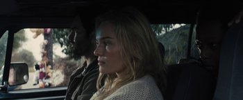 Movie still from “The Domestics” (2018), directed by Mike P. Nelson – A man and a woman sitting in a car; Close Up shot, Over the shoulder angle