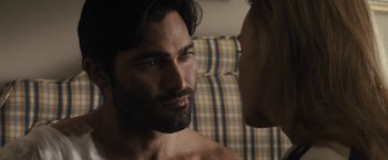 Movie still from “The Domestics” (2018), directed by Mike P. Nelson – A person talking to another person; Close Up shot, Over the shoulder angle