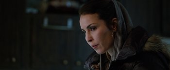 Movie still from “The Drop” (2014), directed by Michaël R. Roskam – A person wearing a jacket; Close Up shot, Low angle