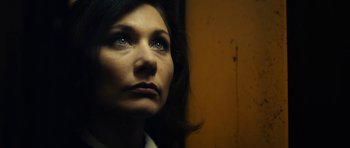 Movie still from “The Duke of Burgundy” (2014), directed by Peter Strickland – A person with blue eyes; Close Up shot, Low angle