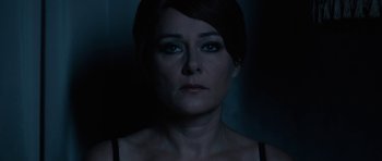 Movie still from “The Duke of Burgundy” (2014), directed by Peter Strickland – A person with blue eyes; Close Up shot, High angle