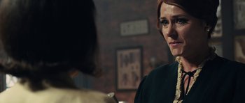 Movie still from “The Duke of Burgundy” (2014), directed by Peter Strickland – A woman in a black jacket is looking at another woman in a black jacket; Close Up shot, Over the shoulder angle