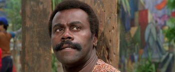 Movie still from “The Enforcer” (1976), directed by James Fargo – A person with a mustache; Close Up shot, Low angle