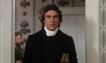 Movie still from “The Europeans” (1979), directed by James Ivory – A man in a black coat and a white neck tie; Close Up shot, Over the shoulder angle