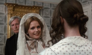 Movie still from “The Europeans” (1979), directed by James Ivory – A woman wearing a veil looking at another woman; Close Up shot, Over the shoulder angle