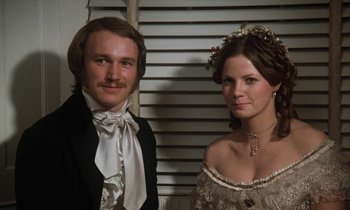 Movie still from “The Europeans” (1979), directed by James Ivory – A man and a woman dressed in period clothing; Close Up shot, Low angle