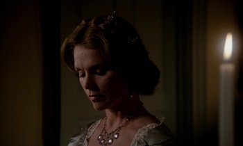 Movie still from “The Europeans” (1979), directed by James Ivory – A person wearing a necklace; Close Up shot, Over the shoulder angle
