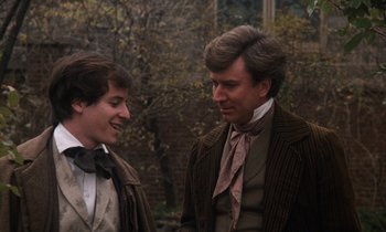 Movie still from “The Europeans” (1979), directed by James Ivory – Two men talking to each other outside in a park; Close Up shot, Over the shoulder angle