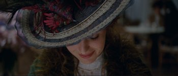 Movie still from “The Extraordinary Adventures of Adèle Blanc-Sec” (2010), directed by Luc Besson – A person wearing a hat; Close Up shot, Low angle