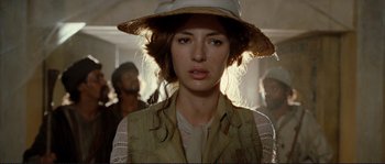 Movie still from “The Extraordinary Adventures of Adèle Blanc-Sec” (2010), directed by Luc Besson – A person wearing a hat; Close Up shot, Over the shoulder angle
