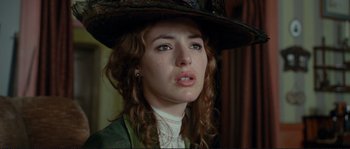 Movie still from “The Extraordinary Adventures of Adèle Blanc-Sec” (2010), directed by Luc Besson – A person wearing a hat; Close Up shot, Low angle