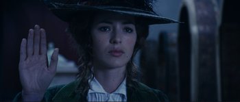Movie still from “The Extraordinary Adventures of Adèle Blanc-Sec” (2010), directed by Luc Besson – A person wearing a hat; Close Up shot, Low angle