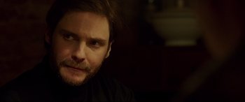 Movie still from “The Face of an Angel” (2014), directed by Michael Winterbottom – A person with a beard; Close Up shot, Over the shoulder angle