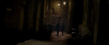 Movie still from “The Face of an Angel” (2014), directed by Michael Winterbottom – Two people walking down a dark alley at night; Extreme Wide shot, Over the shoulder angle