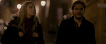 Movie still from “The Face of an Angel” (2014), directed by Michael Winterbottom – A man and a woman walking down a street at night; Close Up shot, Low angle
