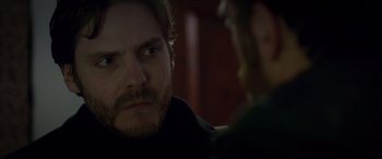 Movie still from “The Face of an Angel” (2014), directed by Michael Winterbottom – A person sitting in a chair; Close Up shot, Over the shoulder angle