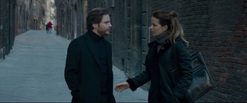 Movie still from “The Face of an Angel” (2014), directed by Michael Winterbottom – A man and a woman talking on the sidewalk; Medium shot, Over the shoulder angle